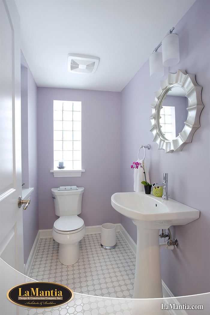 Older home remodel after picture of completed powder room
