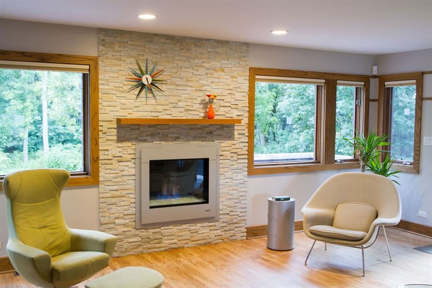 Room addition with stone fireplace