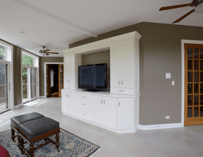 Living space with TV stand built into the wall