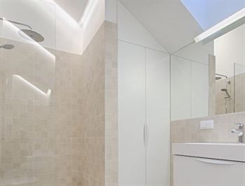 Master bathroom with his and hers shower