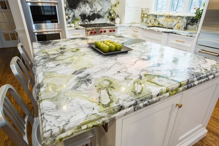 Renovated kitchen with green marbled granite