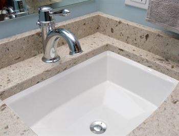 Bathroom sink with silver faucet