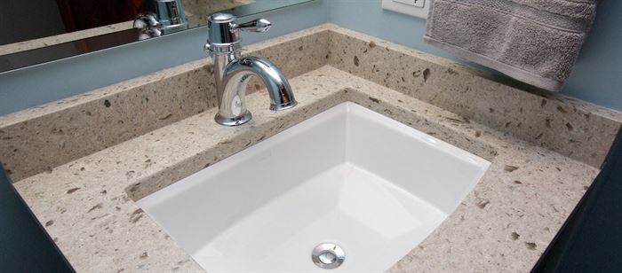 Bathroom sink with silver faucet