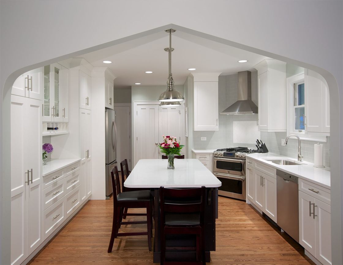 bright white kitchen with eat-in island