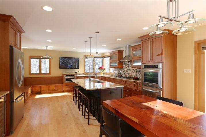large kitchen with custom built-in seating
